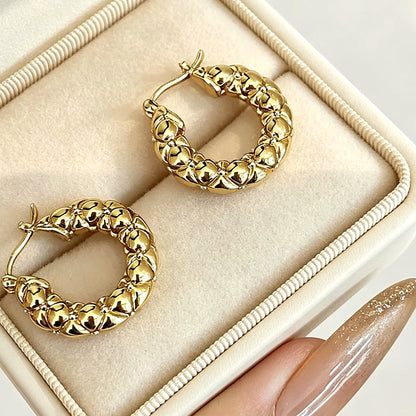 18K solid gold puffed floral hoop earrings in a gift box