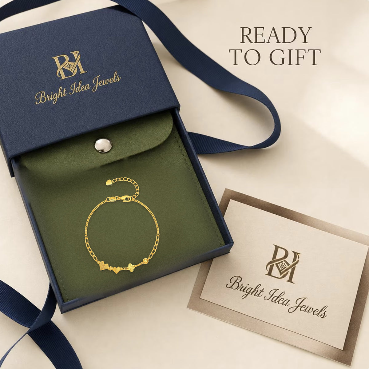 24K pure gold heart and clover charm bracelet in Bright Idea Jewels gift packaging